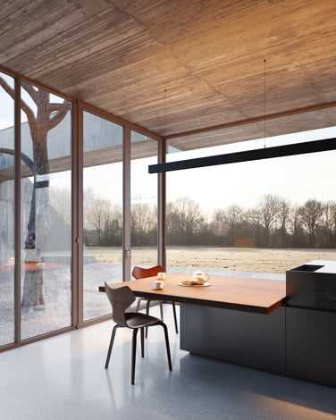 Linear suspended lighting above kitchen table