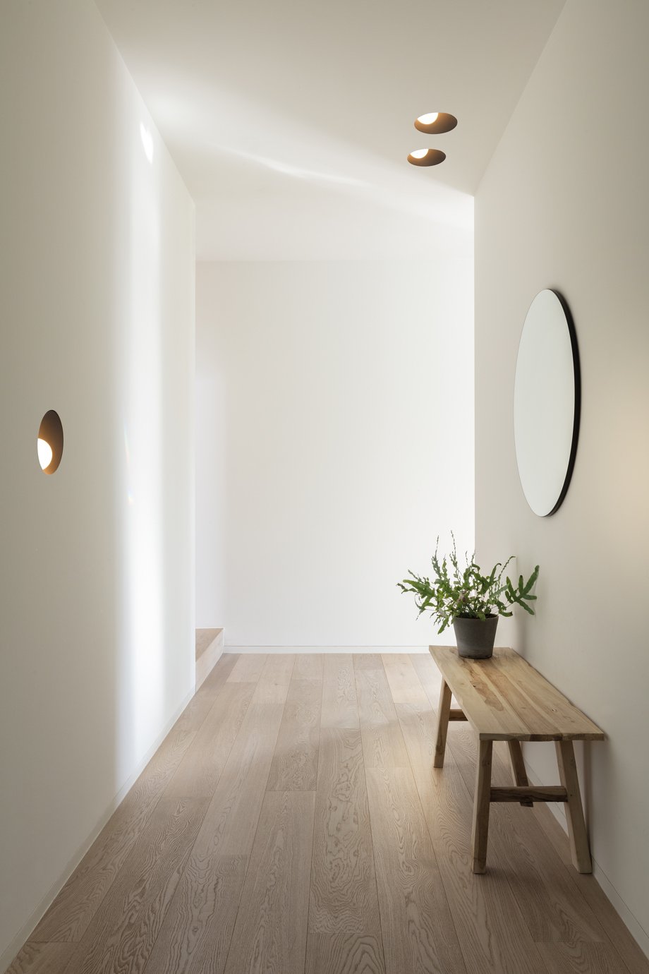 Ceiling and wall lighting in hallway