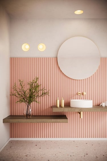 Inspirational wall lighting in pink bathroom