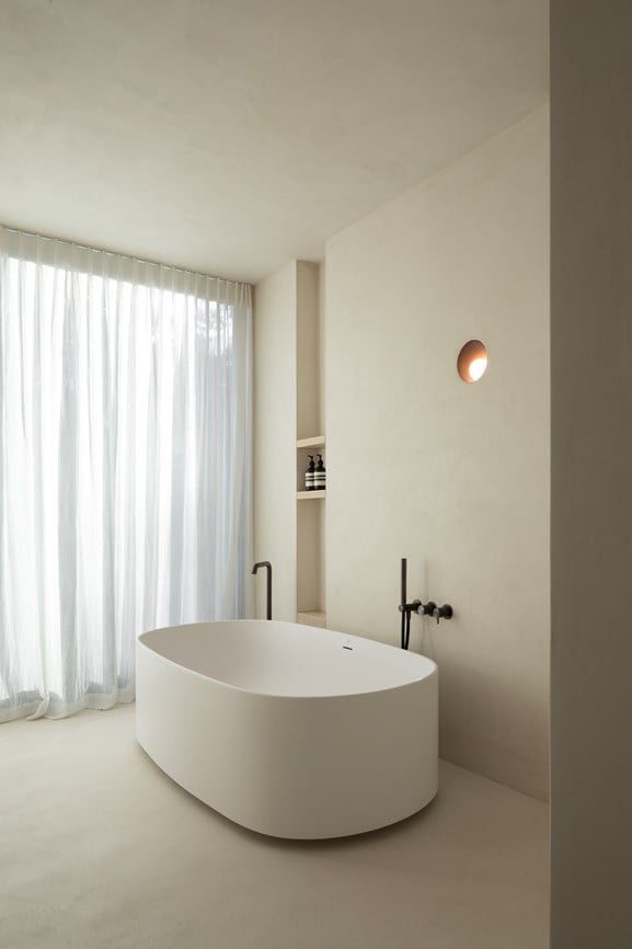 Modern bathroom with recessed wall lighting